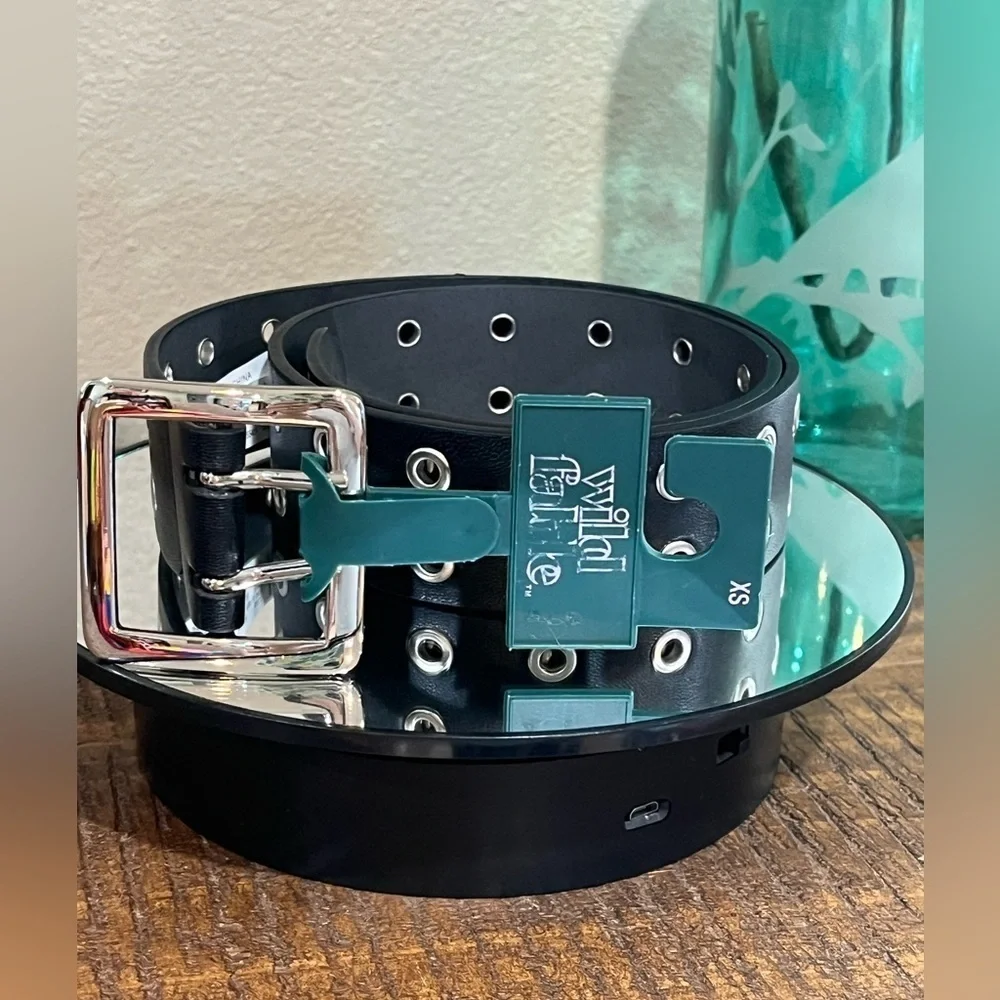 Women’s belt by Wild Fable, black in color with silver  grommets, size XS, new!